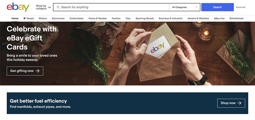 Ebay's homepage with a woman holding a gift card.